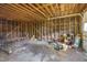 Unfinished garage interior showing exposed wall studs at 1109 N Pinkston St. St, Henderson, NC 27536