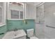 Bathroom featuring a vanity, toilet, and walk-in shower at 1115 Chestnut Dr, Smithfield, NC 27577