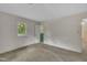 Bedroom features a window and access to an en-suite bathroom at 1115 Chestnut Dr, Smithfield, NC 27577