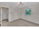 This carpeted bedroom features a window and a closet at 1115 Chestnut Dr, Smithfield, NC 27577