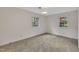 Cozy bedroom with natural lighting from two windows at 1115 Chestnut Dr, Smithfield, NC 27577