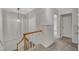Hallway with wood railing and carpet at 1115 Chestnut Dr, Smithfield, NC 27577