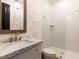 Stylish bathroom featuring shower, commode and a sink with marble countertop at 115 Founders Ridge Dr, Chapel Hill, NC 27517