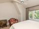 Cozy bedroom with natural light and accent furniture at 115 Founders Ridge Dr, Chapel Hill, NC 27517