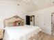 Bright bedroom with a vaulted ceiling and an ornate headboard at 115 Founders Ridge Dr, Chapel Hill, NC 27517