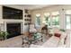 Cozy living room with a fireplace, built-in shelves, and comfortable seating, offering a relaxing atmosphere at 115 Founders Ridge Dr, Chapel Hill, NC 27517