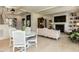 Cozy living room with fireplace, hardwood floors, and decorative furniture at 115 Founders Ridge Dr, Chapel Hill, NC 27517
