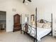 Spacious main bedroom with vaulted ceiling, patterned carpeting and stylish furniture at 115 Founders Ridge Dr, Chapel Hill, NC 27517