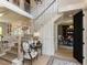 Elegant staircase with white banister and wood trim, seamlessly connecting the home's multiple levels at 115 Founders Ridge Dr, Chapel Hill, NC 27517