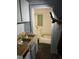 Modest bathroom with neutral color scheme features a sink, vanity and bathtub at 116 Dunstan Ave, Durham, NC 27707