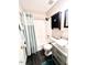 Bathroom features a modern vanity, updated fixtures, and shower-tub combination at 141 Jones Franklin Rd # G, Raleigh, NC 27606
