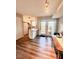 Eat-in kitchen with a white island, a door to the backyard, and dining space at 141 Jones Franklin Rd # G, Raleigh, NC 27606