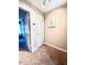 Hallway features carpet flooring, white walls, and art at 141 Jones Franklin Rd # G, Raleigh, NC 27606
