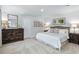 Serene main bedroom suite featuring neutral walls and flooring and stylish furniture at 1537 Ivy Meadow Ln, Zebulon, NC 27597