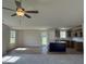 Modern kitchen with granite countertops, stainless steel appliances, and wood cabinets at 166 Coharie Dr, Lillington, NC 27546