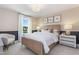 Comfortable bedroom with neutral decor, stylish furnishings, and a bright window view at 2014 Cross Bones Blvd # 30, Durham, NC 27703