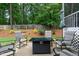 Outdoor seating area featuring a fire pit and chairs at 240 Paddy Ln, Youngsville, NC 27596