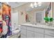 Charming bathroom featuring a tub with shower and vanity with great storage at 240 Paddy Ln, Youngsville, NC 27596