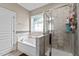 Bathroom with soaking tub and walk-in shower at 240 Paddy Ln, Youngsville, NC 27596