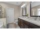 Bathroom with double sink vanity with granite countertop and walk-in shower at 240 Paddy Ln, Youngsville, NC 27596