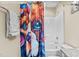 Shower and toilet are included with colorful accessories at 240 Paddy Ln, Youngsville, NC 27596