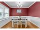 Formal dining room with hardwood floors and ample natural light at 240 Paddy Ln, Youngsville, NC 27596