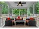 Relaxing covered patio with cushioned chairs perfect for outdoor living at 240 Paddy Ln, Youngsville, NC 27596