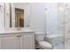 Modern bathroom with marble shower, glass door, and vanity with sleek fixtures at 25 Alex Farm Ct, Zebulon, NC 27597