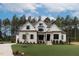 Stunning home with a manicured lawn and inviting entrance, perfect for curb appeal at 25 Alex Farm Ct, Zebulon, NC 27597