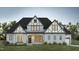 Charming home with gray and white trim, highlighted by landscaped front yard at 25 Alex Farm Ct, Zebulon, NC 27597