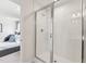 Modern bathroom featuring a sleek glass-enclosed shower and contemporary fixtures at 27 Cribbs Ln, Middlesex, NC 27557