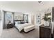Spacious bedroom with large bed, stylish decor, and plenty of natural light from the windows at 27 Cribbs Ln, Middlesex, NC 27557