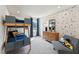 Fun ' bedroom with bunk beds and a playful construction themed wallpaper at 27 Cribbs Ln, Middlesex, NC 27557