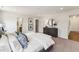 Comfortable bedroom featuring an adjacent bathroom and walk-in closet for optimal convenience at 27 Cribbs Ln, Middlesex, NC 27557