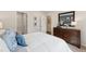 Stylish bedroom featuring a well-organized walk in closet and neutral color scheme at 27 Cribbs Ln, Middlesex, NC 27557