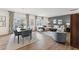 Open concept living room and dining area with stylish decor, hardwood floors, and plenty of natural light at 27 Cribbs Ln, Middlesex, NC 27557