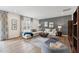 Inviting living room featuring stylish decor, a plush sectional sofa, and an accent wall at 27 Cribbs Ln, Middlesex, NC 27557
