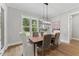 Cozy dining area with a window view and a modern light fixture at 285 Mollie Meadow Dr, Zebulon, NC 27597