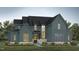 Charming two-story home with stone accents and well-manicured landscaping at 285 Mollie Meadow Dr, Zebulon, NC 27597