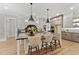 Island kitchen featuring a large island, modern appliances, and ample cabinet space at 285 Mollie Meadow Dr, Zebulon, NC 27597