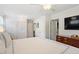Bedroom features a spacious closet, ceiling fan, hardwood floors, and natural light at 2913 Anderson Dr, Raleigh, NC 27608