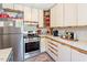 Well-equipped kitchen with stainless steel appliances and modern cabinetry at 2913 Anderson Dr, Raleigh, NC 27608
