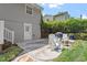Inviting backyard patio with comfortable seating, a grill, and a fire pit, perfect for outdoor gatherings at 2913 Anderson Dr, Raleigh, NC 27608