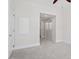 This is a bedroom with light, neutral walls and carpet, closet, and access to a bathroom at 317 W Morgan St # 320, Raleigh, NC 27601