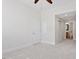 This is a bedroom with light, neutral walls and carpet, closet, and access to a bathroom at 317 W Morgan St # 320, Raleigh, NC 27601