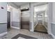 Hallway with an elevator, neutral color scheme and decorative carpeting at 317 W Morgan St # 320, Raleigh, NC 27601