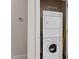 Conveniently located laundry area with stacked washer and dryer at 317 W Morgan St # 320, Raleigh, NC 27601