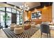 Comfortable lobby with modern decor, including a unique light fixture and stylish furniture at 317 W Morgan St # 320, Raleigh, NC 27601