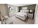 Serene bedroom with large window, plush bedding, and coordinated decor at 330 Cottage Hill Way, Knightdale, NC 27604