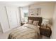 Comfortable bedroom featuring a cozy bed, matching nightstands, and neutral tones at 330 Cottage Hill Way, Knightdale, NC 27604